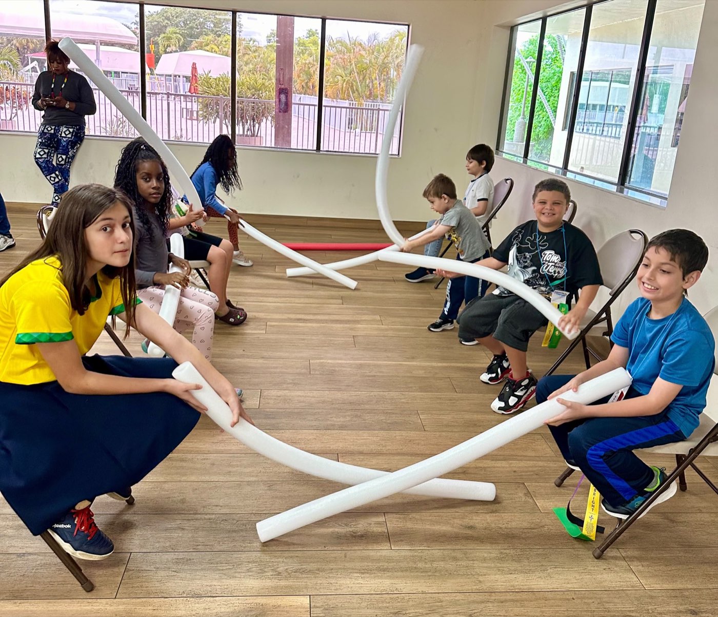 Young people playing a game together at church